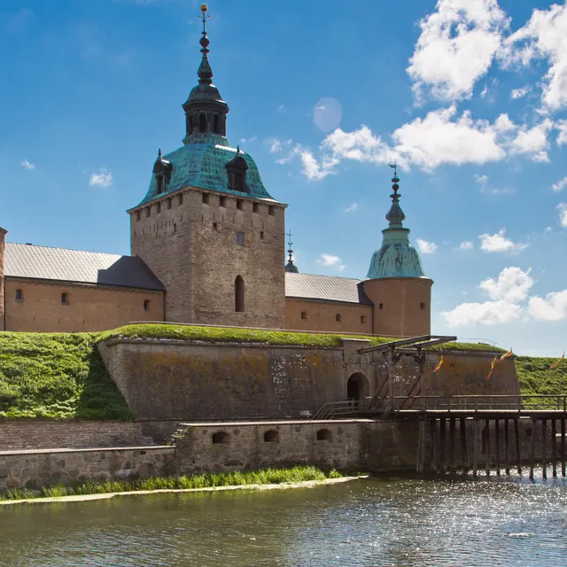 Kalmar Castle and its moat under a blue summer sky